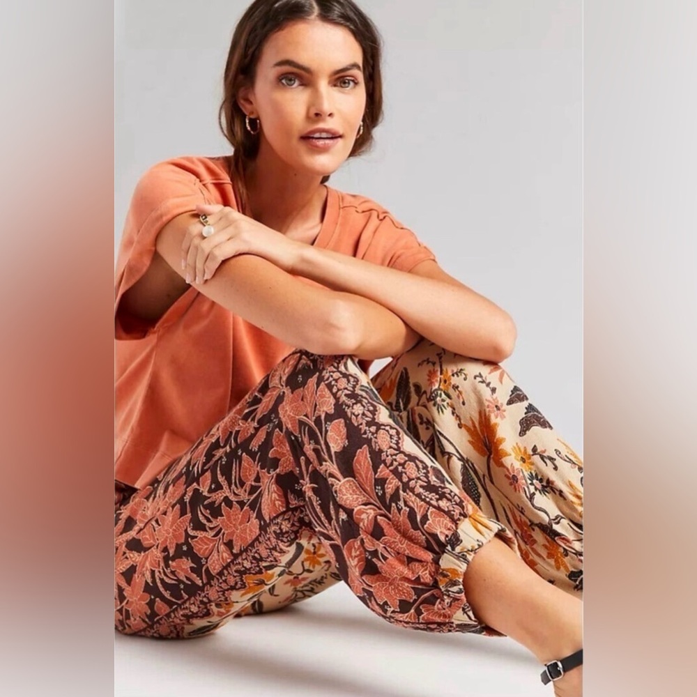 Anthropologie Two-Tone Floral Jogger Pants in Rust, Cream, Black